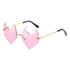 Stylish pink heart-shaped sunglasses with gold accents, ideal for fashionable women seeking trendy optical eyewear and summer accessories.