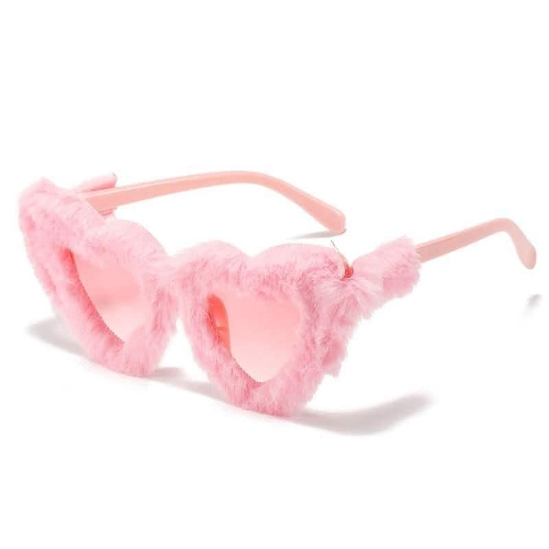 Fashionable pink glasses with fluffy heart-shaped accents, perfect for kids or playful adults. Fun, trendy accessory for adding charm to any outfit.