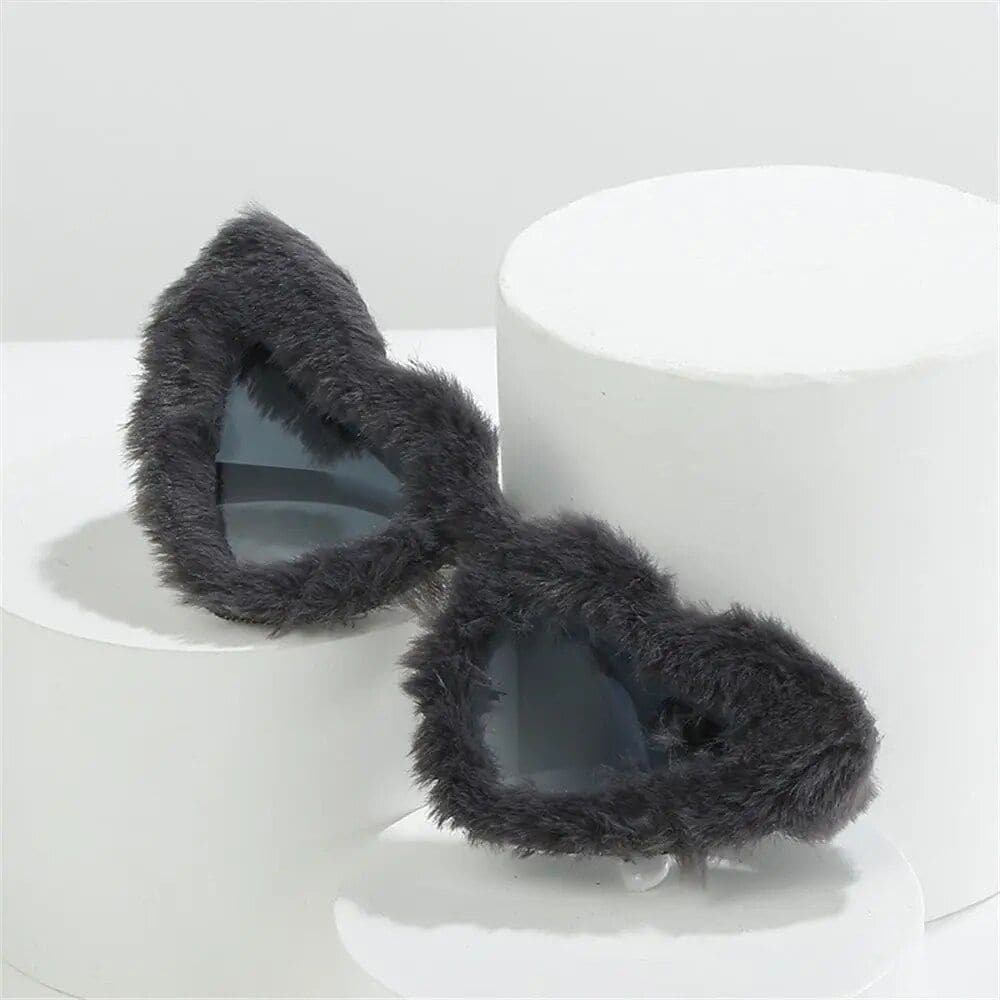 High-quality fuzzy slippers with reflective mirror soles, perfect for cozy indoor wear. Stylish, plush design offers comfort and modern flair, ideal for relaxing at home or as a gift.