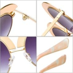 Elegant gold-framed sunglasses with purple gradient lenses and delicate temple details. Perfect for stylish eye protection.