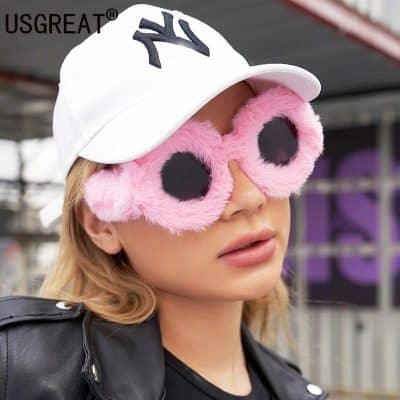 Pink fluffy novelty sunglasses with black lenses, perfect for fashion-forward and playful looks, ideal for parties, festivals, or as a stylish accessory.