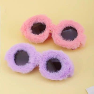 Fuzzy pink and purple round sunglasses with soft faux fur for stylish kids’ eyewear accessories.