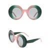 Stylish round green and pink framed sunglasses with UV-protected lenses for fashion-forward look. Perfect for eye protection and trendy accessories.