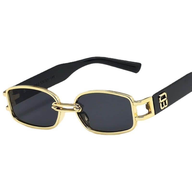 Stylish designer sunglasses with gold accents, black frame, and dark UV-protective lenses for fashion and eye protection. Perfect for adding elegance to any outfit.