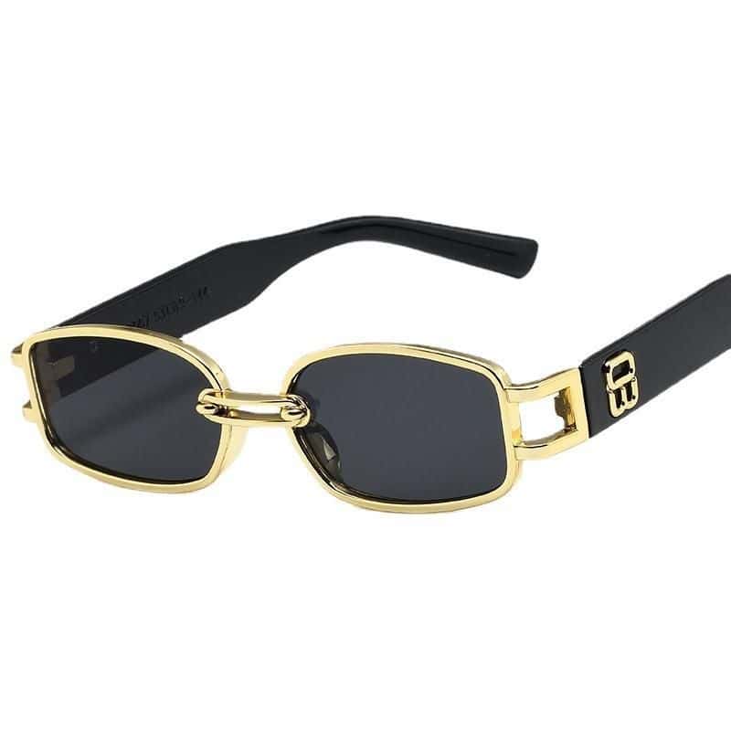 Stylish gold frame sunglasses with dark tinted lenses, designed for women and men, offering UV protection and trendy eyewear options at Monalisa Store. Perfect for fashion-forward individuals.