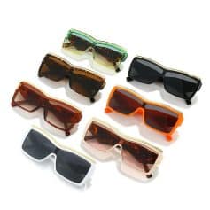 Stylish, trendy sunglasses with oversized frames and multiple color options including black, tortoise, orange, and pastel, perfect for enhancing your fashion and protecting your eyes.