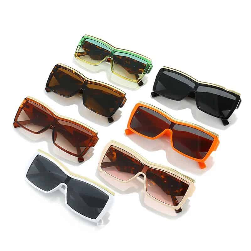 Stylish, trendy sunglasses with oversized frames and multiple color options including black, tortoise, orange, and pastel, perfect for enhancing your fashion and protecting your eyes.