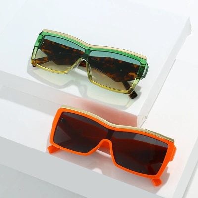 Bright colorful sunglasses for men and women, stylish UV protection eyewear, perfect for summer and outdoor activities.