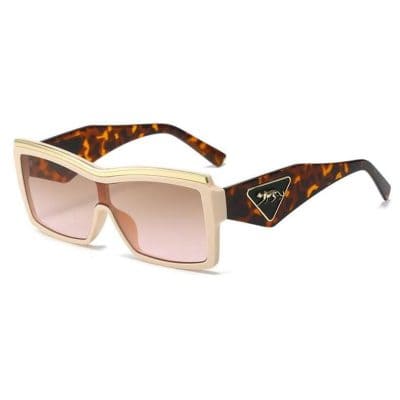 Stylish tortoise shell and beige oversized sunglasses with gradient lenses, perfect for UV protection and fashion enhancement.