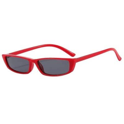 Stylish red sunglasses with dark lenses, perfect for fashion and eye protection, available at Monalisa Medical store.