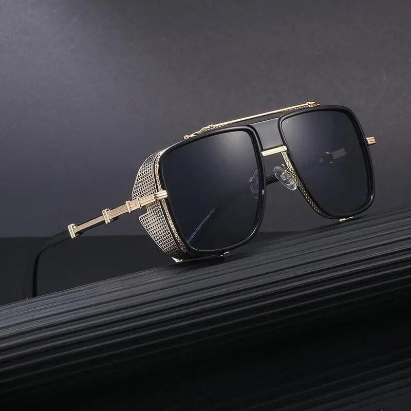 Elegant black designer sunglasses with gold accents and rhinestone embellishments, perfect for fashion-forward eyewear lovers.