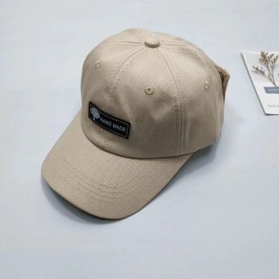 Stylish beige handmade cap with