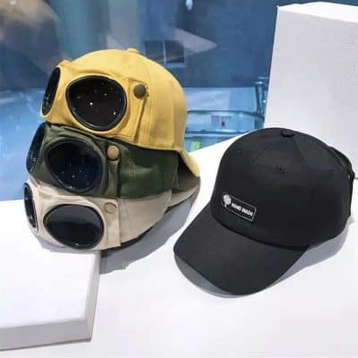 Fashionable baseball caps with built-in camera lenses, perfect for outdoor photography and streetwear enthusiasts. Available in various colors for a trendy look.