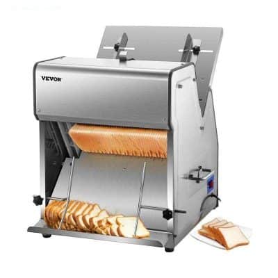 Commercial bread slicer machine for bakery and deli food processing, stainless steel, easy to operate and clean. Perfect for slicing bread, meats, and cheeses efficiently.