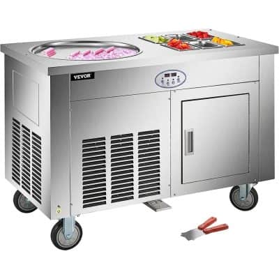 Commercial stainless steel ice cream machine with built-in refrigeration for frozen desserts and gelato. Perfect for cafes, restaurants, and dessert shops.