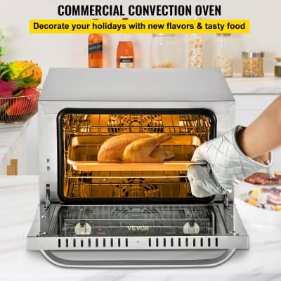 Indoor commercial convection oven with food-ready, whole chicken roasting inside, suitable for restaurants and catering kitchens.