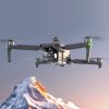 Aerial drone capturing stunning mountain landscape with advanced camera system for high-quality images.