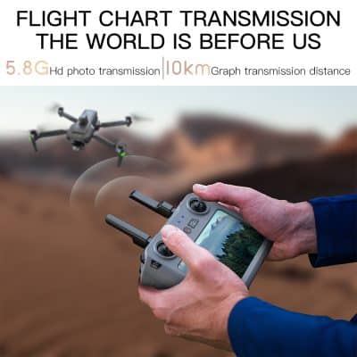 A person controlling a drone with a handheld remote, capturing high-quality images of the landscape, perfect for professional and hobbyist drone pilots.