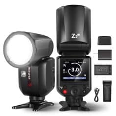 Versatile studio lighting equipment including flash, batteries, charger, and accessories for professional photography and portrait lighting.