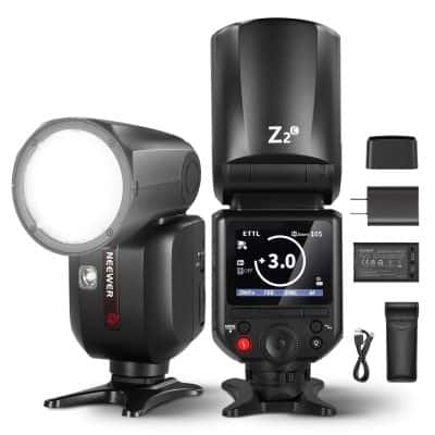 Versatile studio lighting equipment including flash, batteries, charger, and accessories for professional photography and portrait lighting.