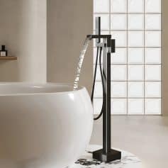 Modern freestanding bathtub faucet with sleek design. Perfect for luxurious bathroom remodels, featuring an elegant waterfall spout and black finish for a contemporary look.