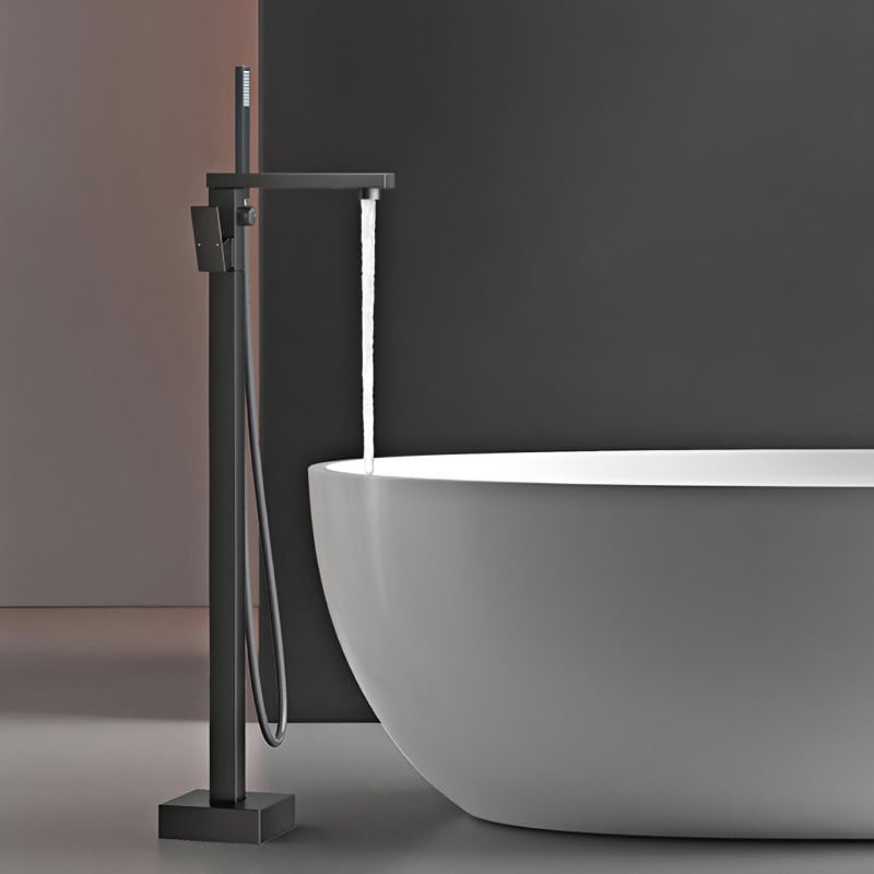 Elegant bathroom sink with black floor-mounted faucet, minimalist modern design, ideal for spa, vanity, or luxury home bathrooms, combining style and functionality.