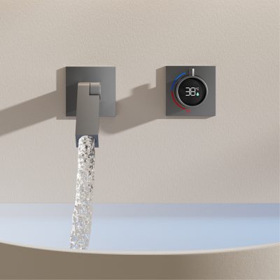 Modern water faucet with digital thermostat displaying 38°C, perfect for precise temperature control in medical or spa environments.