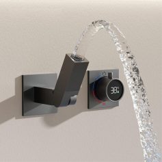 Smart modern faucet with digital temperature display and water flow for bathroom or kitchen. Features sleek design and precise control, ideal for hygienic water settings.
