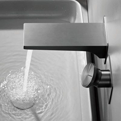 Stainless steel water tap with adjustable knob in a professional setting, ideal for laboratories, medical facilities, or commercial kitchens, emphasizing durability and hygiene.