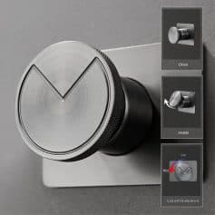 Modern metallic thermostat with temperature adjustment and ON/OFF switches, ideal for home and office climate regulation and smart device integration.