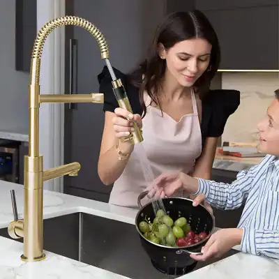High-quality gold-finish kitchen faucet with flexible hose, perfect for daily kitchen tasks, durable construction, and stylish look.