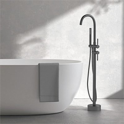 Luxury freestanding bathtub with contemporary black faucet, towel rack, and minimalist design, ideal for modern bathrooms, spas, and upscale home remodeling. Upgrade your bathing experience.