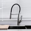 Modern stainless steel kitchen faucet with high-arc design.