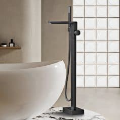 Elegant bathroom with a stylish black bathtub faucet and handheld shower, complemented by a minimalist design and marble flooring for a luxurious look.