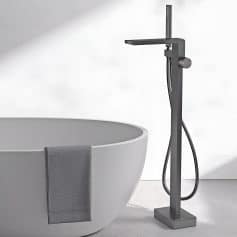Bathroom tub with black floor-mounted faucet and hose, contemporary design, minimalist aesthetic, perfect for luxury spa, home bath update, elegant and functional decor, premium fixtures.