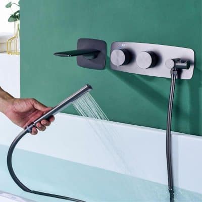 A sleek, wall-mounted water faucet with integrated handheld shower head, perfect for medical or salon use, offering adjustable temperature controls and easy operation.