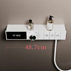 High-tech medical bedside control panel with digital display, temperature control, and skincare dispenser bottles for hospital and clinic environments.