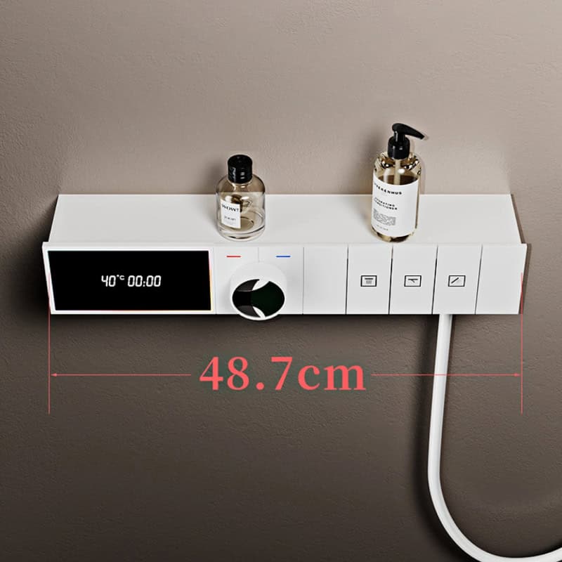 High-tech medical bedside control panel with digital display, temperature control, and skincare dispenser bottles for hospital and clinic environments.