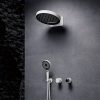 Minimalist black and white shower head with handheld option for a contemporary bathroom, featuring stylish fixtures and wall-mount design.