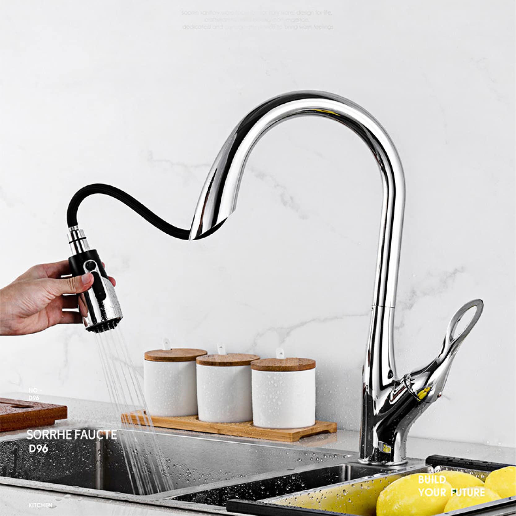 Faucet with pull-down spray head ideal for kitchen sink, featuring sleek chrome design for easy water control and cleaning.
