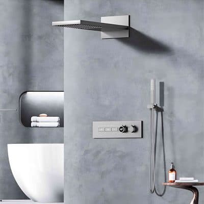 Minimalist bathroom with sleek showerhead, wall controls, and contemporary toilet, designed for comfort and style, ideal for premium healthcare or cosmetic clinics.