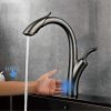 Advanced touch-activated kitchen faucet with sleek black finish, hands-free operation, and water flow control for modern kitchen convenience.