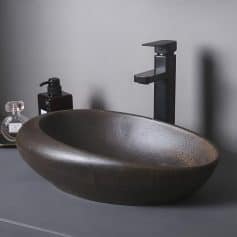 Luxurious stone vessel sink perfect for contemporary bathroom designs.