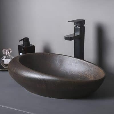 Luxurious stone vessel sink perfect for contemporary bathroom designs.