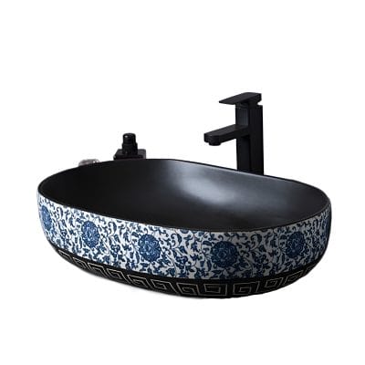 Elegant black and blue decorative sink with a floral pattern, suitable for modern bathrooms and opt spaces. Adds sophistication and style to your interior decor.