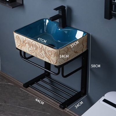 High-quality decorative sink with floral design, perfect for salons and clinics. Features durable ceramic material and modern black faucet, ideal for cosmetic and optometry spaces.