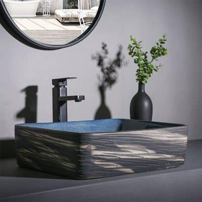 Stunning black faucet and stylish sink designed for eye exam clinics. Ideal for optical offices seeking sleek, functional sink solutions.