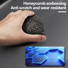 Close-up of honeycomb embossed anti-scratch work surface with a small, textured embossed foam piece, demonstrating wear resistance and innovative design for workspaces.