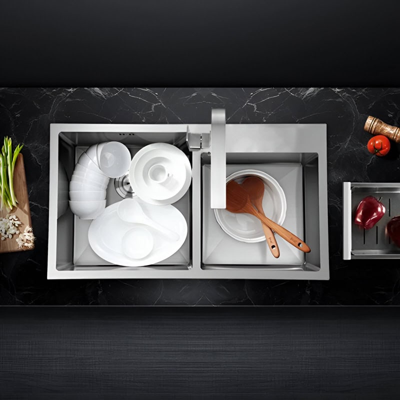Clean and stylish kitchen sink with organized dishware and wooden utensils for modern home aesthetics.