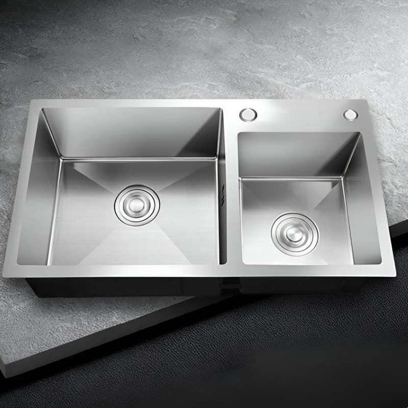 Stainless steel double kitchen sink with two basins, modern design, durable and easy to clean, ideal for residential and commercial kitchens.